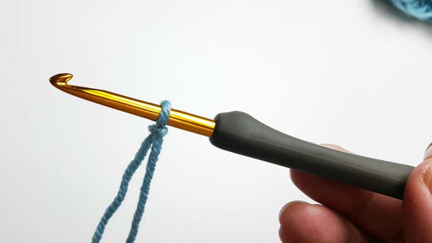 An image of a crochet slip knot on a hook