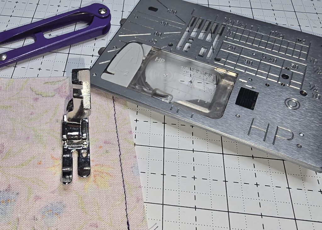 Beth is showing a sewn fabric with quarter inch allowance using the Janome HP foot and plate