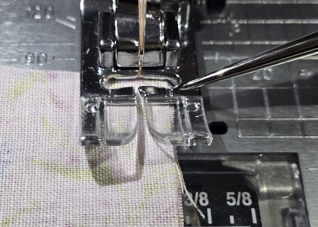 Beth is showing fabric placement against Janome standard foot and straight stitch plate to sew the quarter inch allowance on sttich number 1