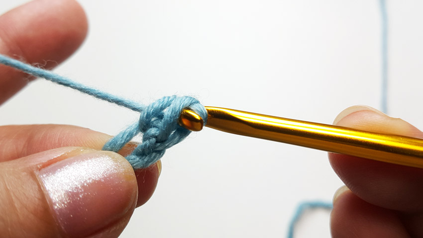 an image showing pulling two loops through